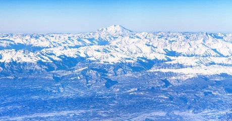 Fototapeta na wymiar Aerial view of Caucasus mountains and Mount Elbrus