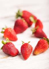Strawberries on the wooden background