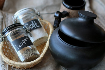 capacity for salt and pepper on linen background basket