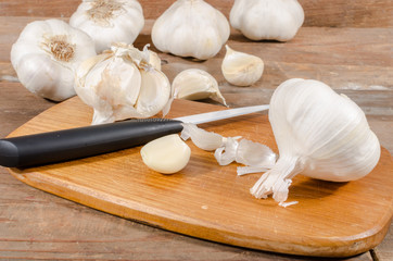White garlic bulbs and cloves