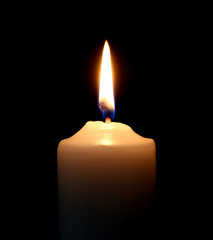 Candle on over dark background