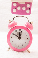 alarm clock and contraceptive pills
