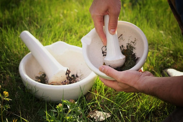 mixing grinding spices in a mortar
