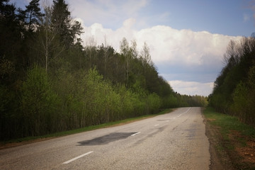 rural landscape road stretches into the distance