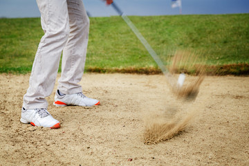 Man playing golf