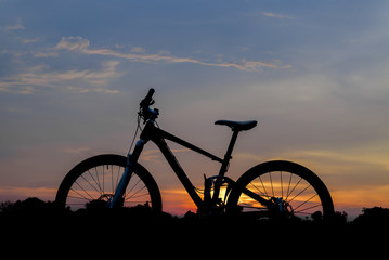 Fototapeta na wymiar Silhouette shot of mountain bike