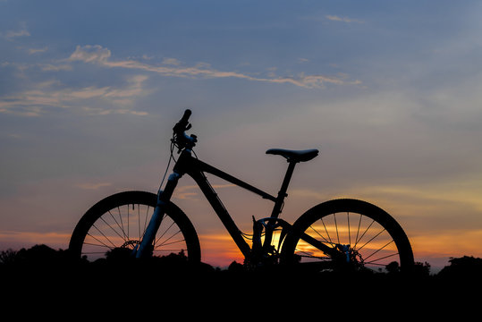 Silhouette shot of mountain bike