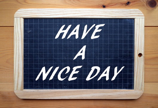 Have a Nice Day in white text on a slate blackboard
