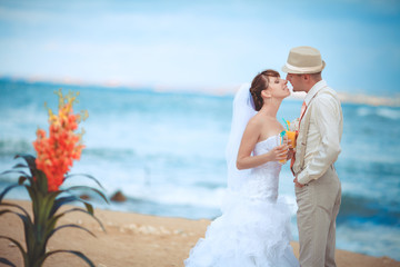 Fototapeta na wymiar Kissing bride groom wedding day outdoors