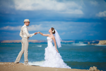 Kissing bride groom wedding day outdoors