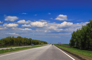  highway on a background of clouds and sky in the summer