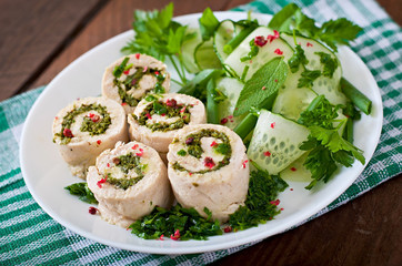 Steamed chicken rolls with greens and fresh vegetable salad