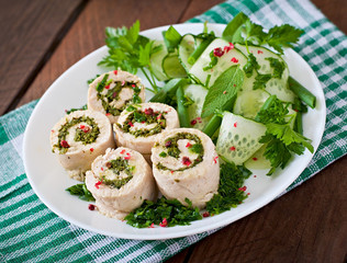 Steamed chicken rolls with greens and fresh vegetable salad