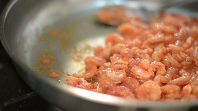 cooking king shrimp in pan