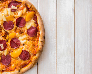exotic pizza with pineapple and peach 