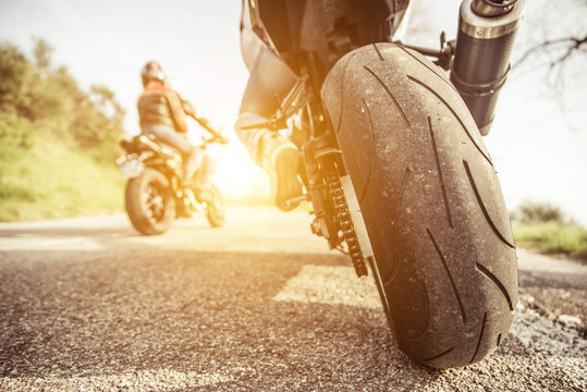 Two Motorcycles On The Hills