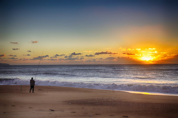 Obraz premium Fisherman and sunset