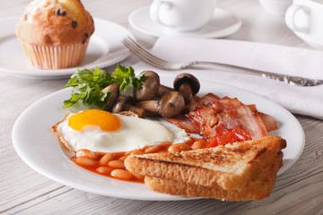 A hearty English breakfast close-up on a plate. Horizontal
