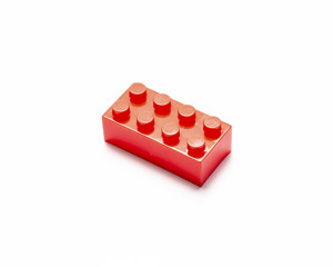 Red colored plastic building block for kids