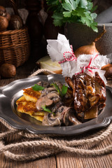 Grilled ribs with potato pancakes