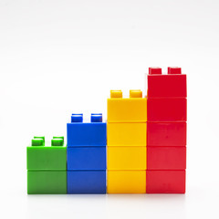 Colorful stacked toy building blocks. - 83664695