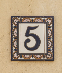 Numeral 5 of old ceramic tile