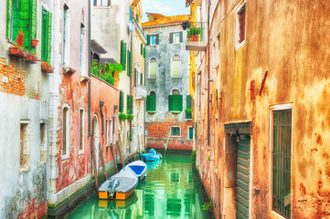 Fototapeta na wymiar HDR - Narrow canal in Venice, Italy.