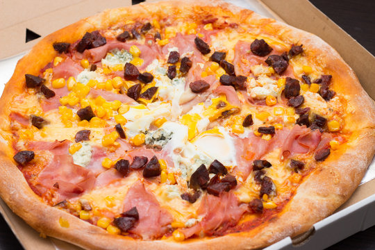 Pizza With Ham Corn And Sausages