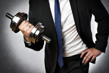 businessman with dumbbell