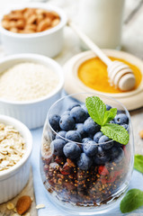 oatmeal nuts quinoa granola with blueberries
