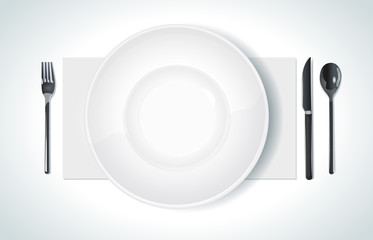 Clean plate with knife and fork