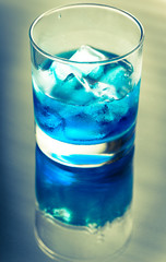 Glass of blue curacao cocktail