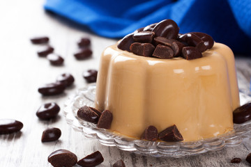Coffee panna cotta with chocolate candies