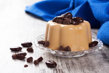 Coffee panna cotta with chocolate candies