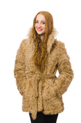 Redhead girl in fur coat isolated on white