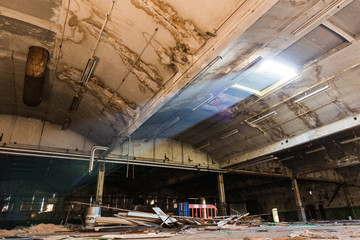 Lightbeam shines into derelict warehouse