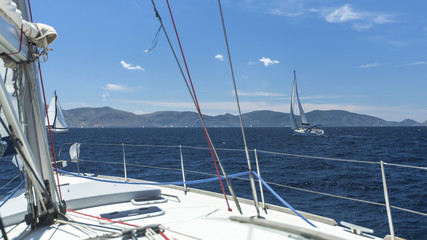 Fototapeta na wymiar Sailing yacht race. Boat competitor of sailing regatta.