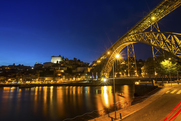 View of the historic city of Porto, Portugal at night time.