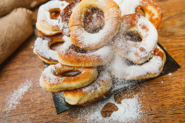 Homemade donuts on a wooden table