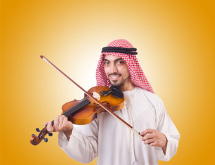 Arab man playing music on white