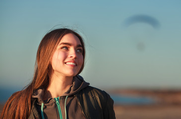 beautiful girl and paraplane