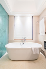 Naklejka na ściany i meble Modern bathroom interior with bathtub
