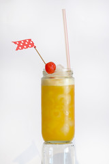 cocktail with chery, flag and straw