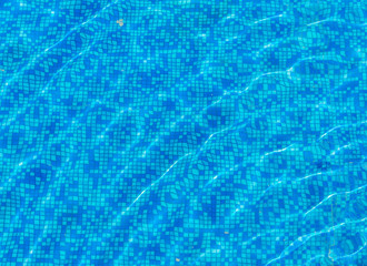 Texture of blue water in the pool