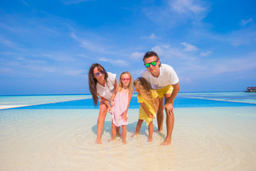 Beautiful family during summer tropical vacation