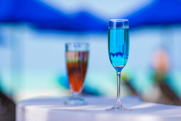 Colorful exotic tasty cocktails in outdoor cafe