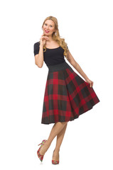 Beautiful young woman in plaid dress isolated on white