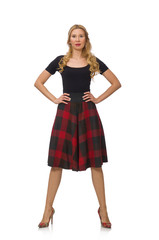 Beautiful young woman in plaid dress isolated on white