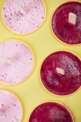 making homemade summer fruit lolly pops ice cream