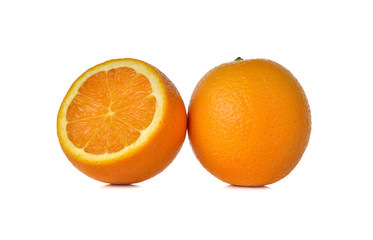 whole ripe orange on white background